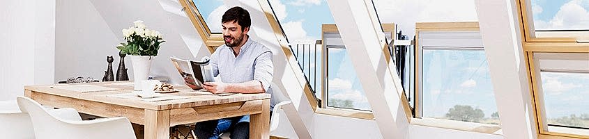Innovative, large roof window in which the open sashes create a balcony - FAKRO